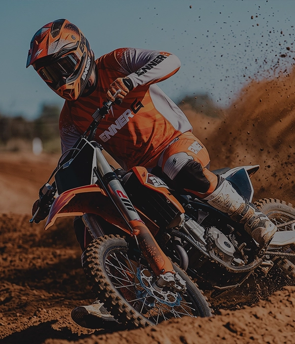 Motocross rider wearing custom EnnerG gear