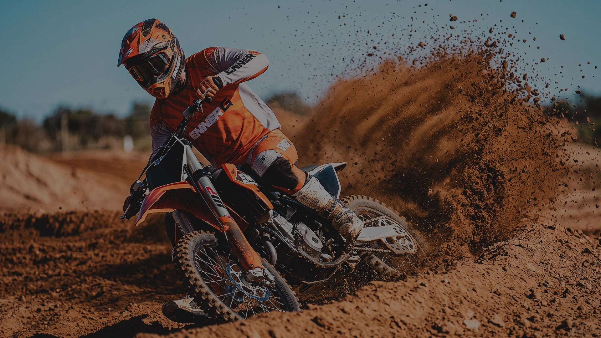 Motocross rider wearing custom EnnerG gear